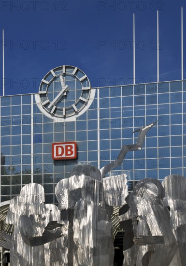 A stainless steel figure group at the main railway station entitled The Ring by Horst Antes, Düsseldorf, North Rhine-Westphalia, Germany, Europe