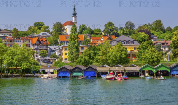 Waterfront with boathouses and St Joseph's Church on the Schlossberg, Starnberg, Lake Starnberg, Bavarian Alpine Foreland, Upper Bavaria, Bavaria, Germany, Europe