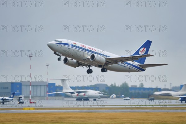 MINSK, BELARUS, JUNE 15, 2018: Belavia belarusian airlines flight Boeing 737-500 plane taking off on runway in National Airport Minsk