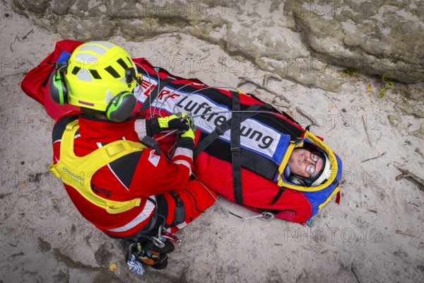 Winch rescue training of the rescue helicopter, Christoph 62, on the occasion of the 50th anniversary of the DRF Luftrettung. The rescue of casualties in the Elbe Sandstone Mountains will be practised