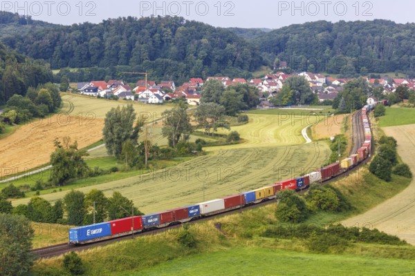 Goods train Train with containers on the Filstal railway in Lonsee, Germany, Europe