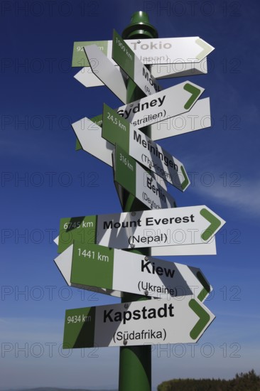 World signpost, Noah's Sails lookout tower at Ellenbogen, 813 m. high mountain of the Rhoen in the district of Schmalkalden-Meiningen, Thuringia, Germany, Europe