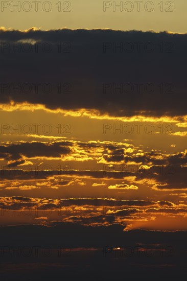Vibrant colorful clouds in orange and red. Namibia