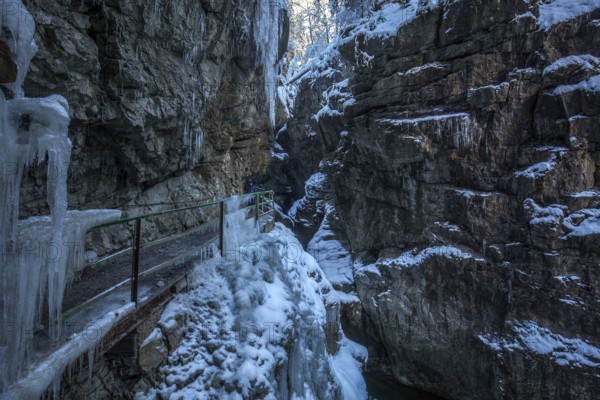 Winter, snowy landscape, icicles, river Breitach and hiking trail through the Breitachklamm gorge near Oberstdorf, Oberallgäu, Allgäu, Bavaria, Germany, Europe