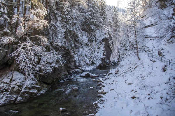 Winter, snowy landscape, river Breitach and hiking trail through the Breitachklamm gorge near Oberstdorf, Oberallgäu, Allgäu, Bavaria, Germany, Europe
