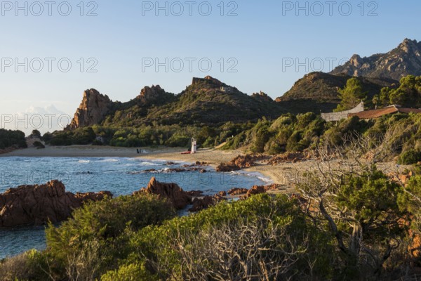 Lonely picturesque beach and red rocks, Spiaggia Su Sirboni, sunrise, near Tertenia, Province of Ogliastra, Sardinia, Italy, Europe