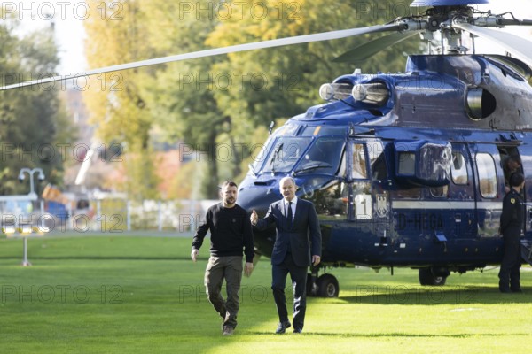 Volodymyr Zelensky (President of Ukraine) is received by Olaf Scholz (Chancellor of the Federal Republic of Germany) after his arrival by helicopter in front of the Federal Chancellery, 11 October 2024