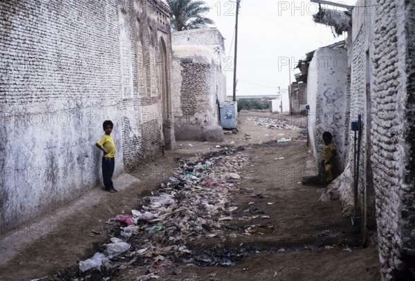 Dirty, rubbish-strewn street in Zebid, Zabid, Yemen 1998 UNESCO World Heritage Site