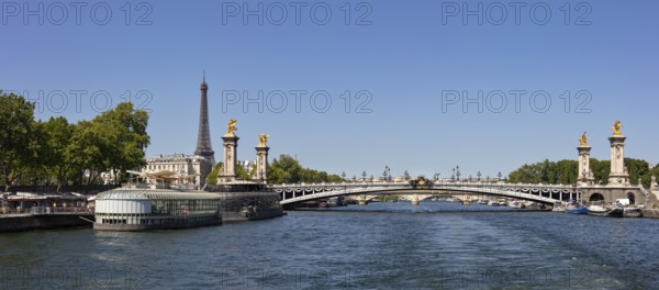 View across the Seine to the bridge with the Eiffel Tower in the background, Paris