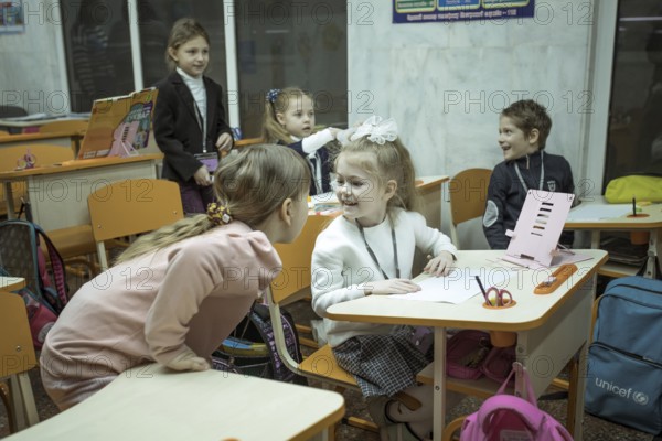Pupils in a classroom in one of the metro schools in Kharkiv. Classrooms were set up in various metro stations in the city in order to keep classes running even during an air raid, Metro Universytet, Kharkiv, Ukraine, Europe