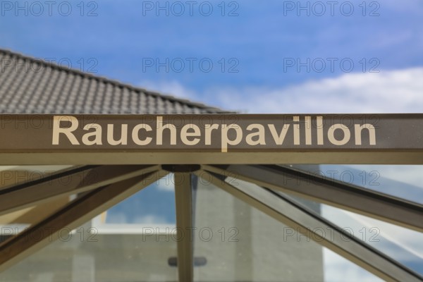 Smoking pavilion, glass shelter, smoking cabin, lettering, letters, Reutlingen, Baden-Württemberg, Germany, Europe