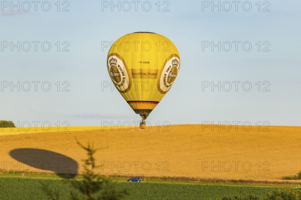 Summer balloon flight over the foothills of the Osterzgebirge mountains