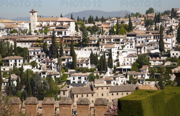 View of historic Moorish buildings in the Albaicin district of Granada, Spain seen from the Alhambra