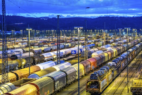 The Hagen-Vorhalle marshalling yard, one of the 9 largest in Germany, is located on the Wuppertal-Dortmund railway line and has 40 directional tracks on which goods trains are assembled, in the evening, North Rhine-Westphalia, Germany, Europe