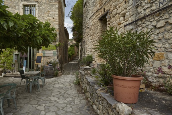 Restuarant in an old stone house in La Roque-sur-Cèze, Département Gard, Occitanie region, France, Europe