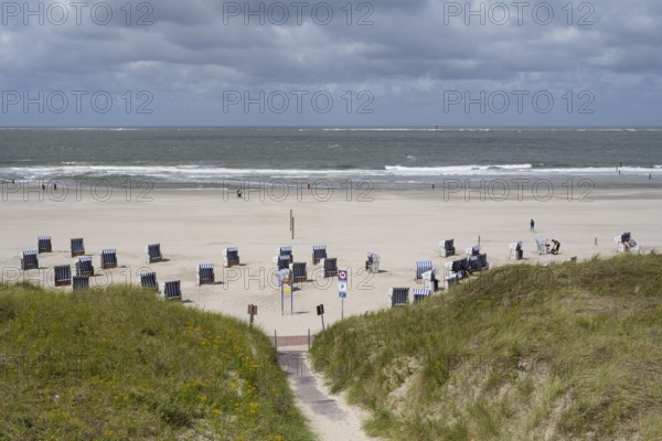 Beach chairs on the sandy beach, dunes, North Sea coast, Lower Saxony Wadden Sea National Park, Norderney, East Frisian Island, East Frisia, Lower Saxony, Germany, Europe