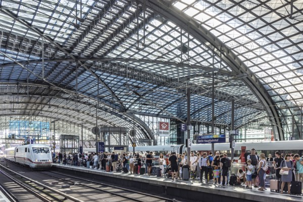Central station with glass roof construction, crowds of people on the platform, Deutsche Bahn ICE, Berlin, Germany, Europe