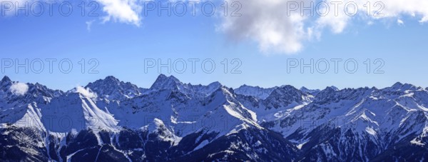 Alpine panorama with snow-covered mountain peaks in winter. Taken in the ski resort of Serfaus Fiss Ladis (Tyrol, Austria)