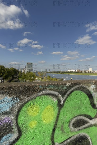 Panorama from the graffiti painted south bridge over the southern Rheinau harbour, the Rhine and the Deutz district on the right bank of the Rhine, Cologne, Rhineland, North Rhine-Westphalia, Germany, Europe
