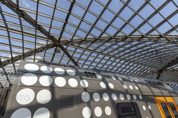Local train and glass roof at Cologne Central Station, Cologne, Rhineland, North Rhine-Westphalia, Germany, Europe