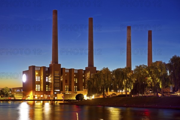 Wolfsburg NordSüd cogeneration plant in the evening with Mittellandkanal, Volkswagen AG main plant, Lower Saxony, Germany, Europe