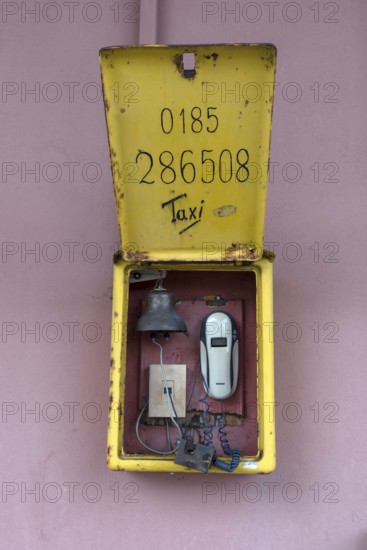 Railway telephone at the station building in Portofino, Italy, Europe