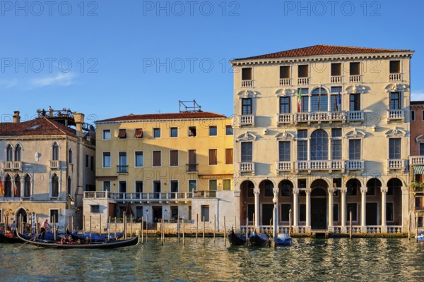 VENICE, ITALY, JUNE 27, 2018: Grand Canal with boats and gondolas on sunset, Venice, Italy, Europe