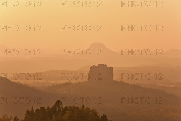 View from the Carola rock into the Schrammstein area in the back of Saxon Switzerland, to the Falkenstein and the Lilienstein