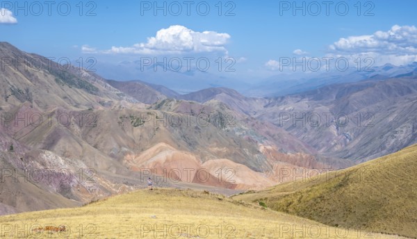 View over eroded mountainous landscape with brown hills, mountains and steppe, Chuy province, Kyrgyzstan, Asia