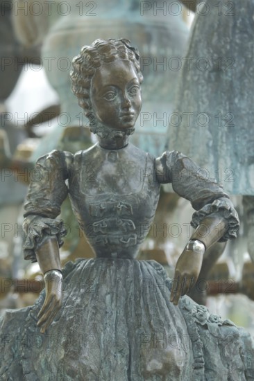 Sculpture Kurgast-Brunnen by Bonifatius Stirnberg 1980 with figure with Biedermeier clothing, woman, historical, detail, place Rueil Malmaison, Bad Soden, Taunus, Hesse, Germany, Europe