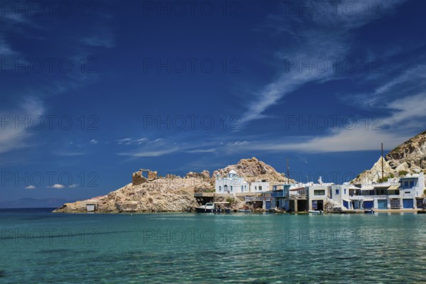 Greek village scenic picturesque view in Greece, the beach and fishing village of Firapotamos in Milos island, Greece, Europe
