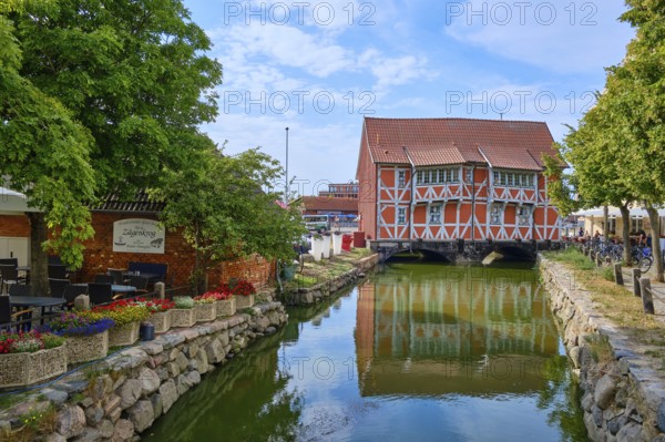 So-called Gewölbe, a heritage-protected half-timbered house over the Mühlenbach in the historic old town, at Runden Grube 4, Hanseatic City of Wismar, Mecklenburg-Western Pomerania, Germany, Europe