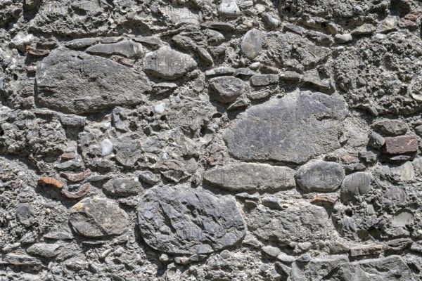 Different types of stone processed into a wall Format-filling