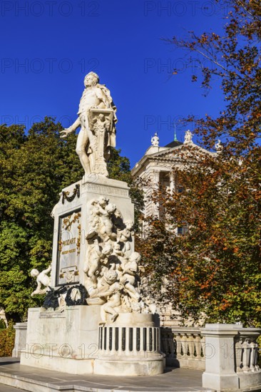 Mozart monument in the Burggarten, behind the façade of the House of Austrian History, Burggarten, Vienna, Austria, Europe