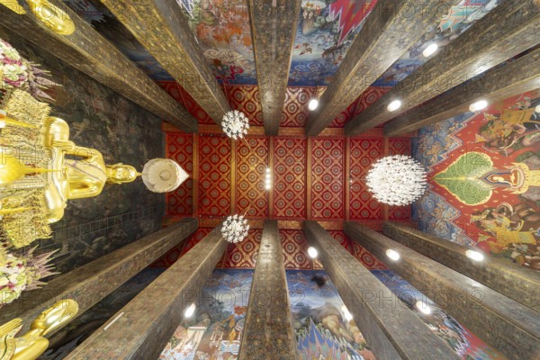 Frog's-eye view: coffered ceiling and golden Buddha statue, Bhumispara-mudra, Buddha Gautama at the moment of enlightenment, Wat Worawihan, Wat Prayurawongsawas Worawihan, Bangkok, Thailand, Asia