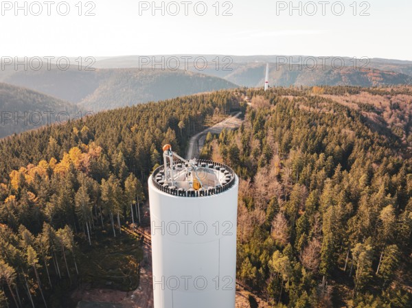 Breathtaking view from a wind turbine over an autumnal forest, wind turbine construction, Calmbach, Black Forest, Germany, Europe