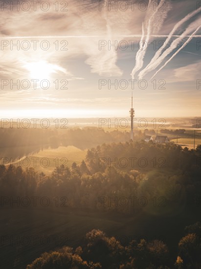 Elevated view of a scenic area with a tower, sunlight and cloudy sky, Gechingen, Black Forest, Germany, Europe