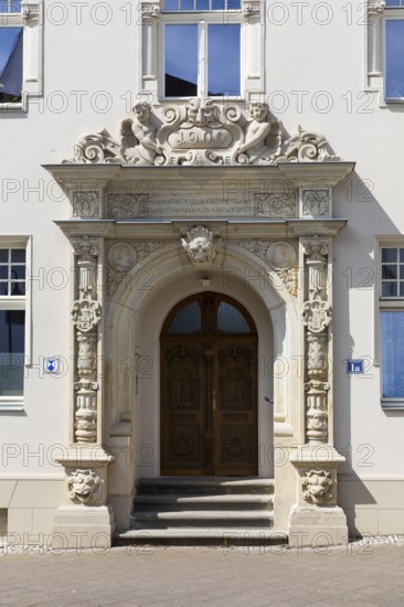 Richly decorated portal of the Seidemannhaus in the city centre of Taucha, Saxony, Germany, Europe