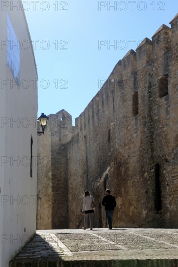Historic street and castle walls in the village of Vejer de la Frontera, Cadiz Province, Spain, Europe