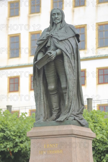 Monument to Duke Ernst I the Pious of Saxe-Gotha-Altenburg, sculpture with book and inscription, Gotha, Thuringia, Germany, Europe