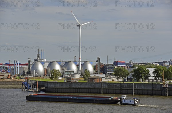 Europe, Germany, Hanseatic City of Hamburg, Elbe, harbour, view to the digesters, digesters, sewage treatment plant Hamburger Wasserwerke Köhlbrandhöft, wind energy plant, Europe