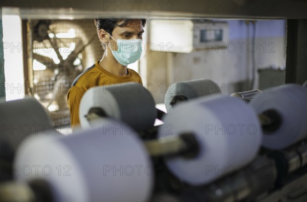 Employees of Inter Market Knit Private Limited producing socks. Lahore, 22.08.2024. Photographed on behalf of the Federal Ministry for Economic Cooperation and Development