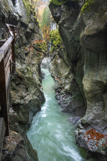 The river Lammer in the gorge Lammerklamm (Lammeröfen) . A path leads through the gorge on the left. Autumn. Scheffau, Lammertal, Salzburger Land, Upper Austria, Austria, Europe
