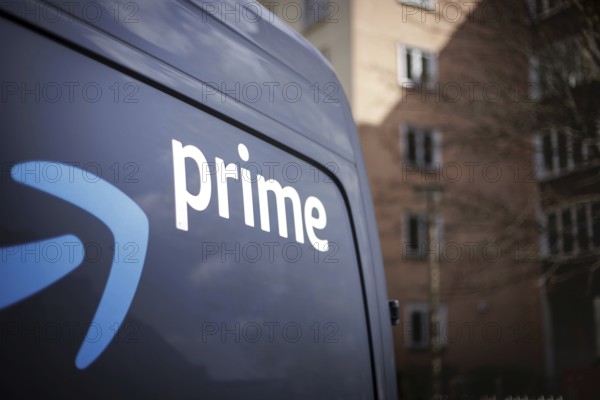 A detail of a trolley labelled prime from the online mail order company Amazon prime in a housing estate. Berlin, 28.03.2024