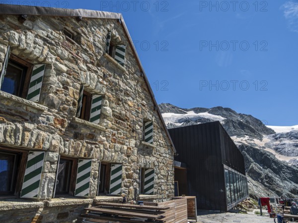 Mountain hut Cabane de Moiry, located close to the retreating Moiry glacier, Valais, Switzerland, Europe