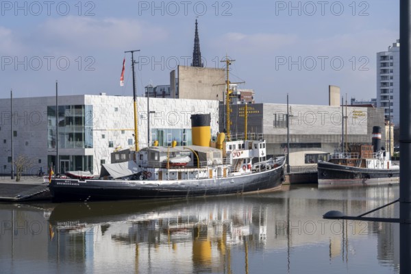 German Emigration Centre, museum on emigration and immigration from and to Germany, at the New Harbour, extension with faces of descendants of immigrants to Germany, Bremerhaven, Bremen, Germany, Europe