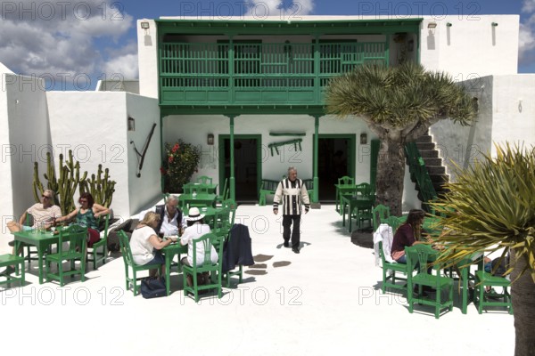 Museum and folklore arts centre, Casa Museo Monumento al Campesino, Lanzarote, Canary Islands, Spain- waiter wearing uniform designed by Cesar Manrique