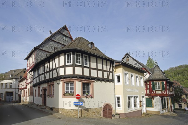 Half-timbered houses with bay windows, corner house, round, Amtsgasse, Meisenheim, Rhineland-Palatinate, Germany, Europe