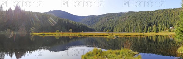 Autumn atmosphere at the small Arbersee lake in the Bavarian Forest