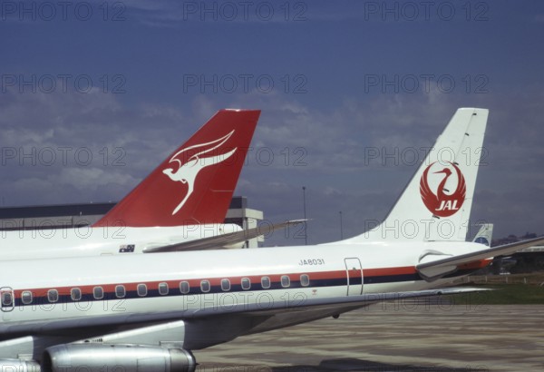 Tail fins of Quantas and Japan Airlines aircraft JAL8031 Douglas DC 8 60/70 in 1974